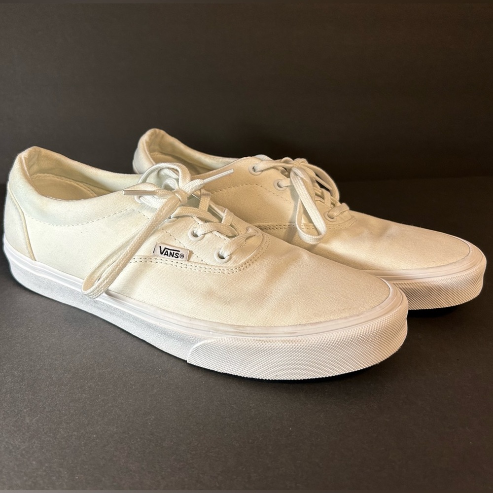 White low cut vans.